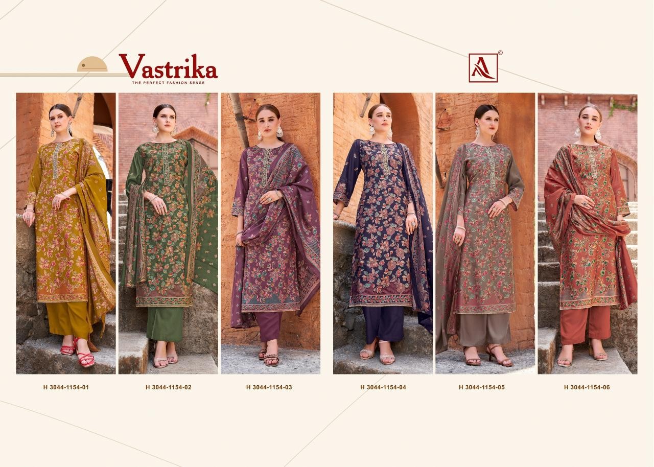 ALOK SUIT - VASTRIKA - VISCOSE MUDAAL DISCHARGE PRINT WITH EMBROIDERY WORK & ELEGANT HAND WORK SUIT 