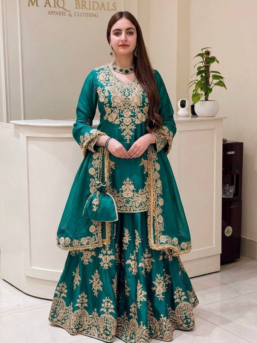 Shop MT-1079 heavy natural silk embroidered palazzo suit with Chine sequence work, Micro Cotton inner and faux georgette lace-border dupatta.