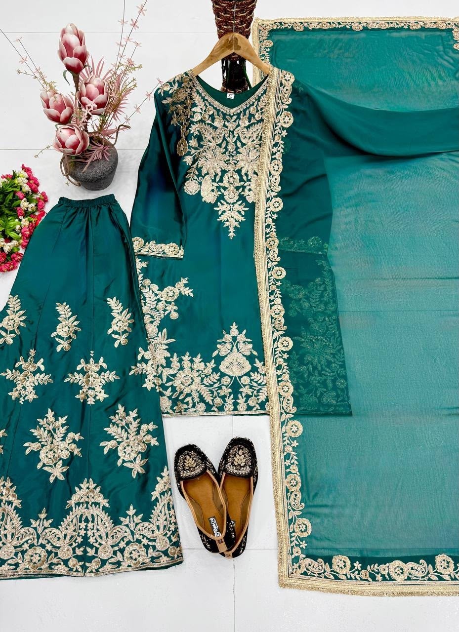 Shop MT-1079 heavy natural silk embroidered palazzo suit with Chine sequence work, Micro Cotton inner and faux georgette lace-border dupatta.