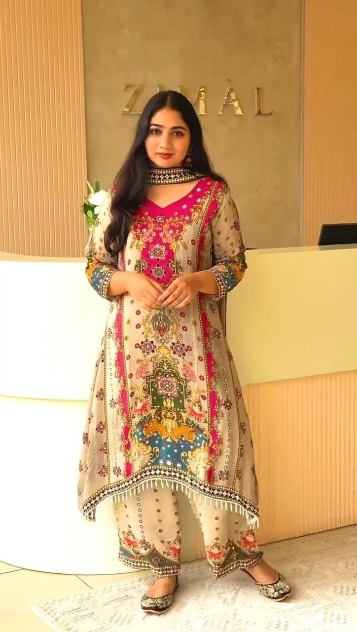 Shop DHK-1327 Pure Chinon Silk A-Line Kurta Palazzo Set with digital print, real mirror handwork, lace border and Heavy Faux Georgette dupatta at ₹899/-.