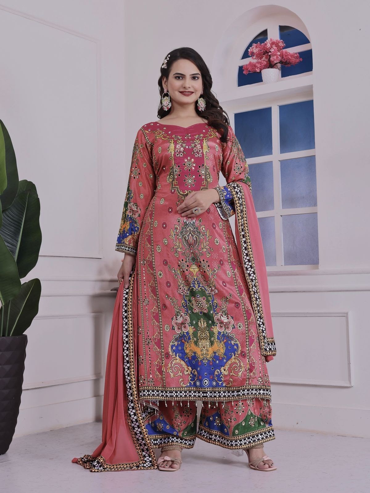 Shop DHK-1327 Pure Chinon Silk A-Line Kurta Palazzo Set with digital print, real mirror handwork, lace border and Heavy Faux Georgette dupatta at ₹899/-.