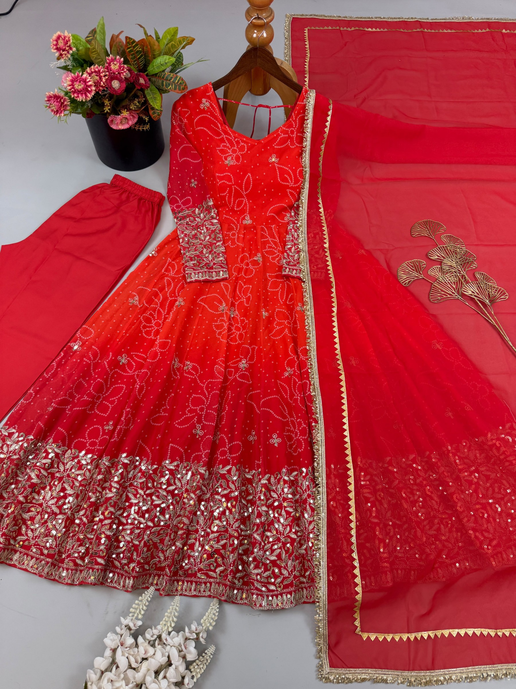Shop SRK-5375 Faux Georgette suit with embroidery, sequins and digital print top, Heavy Micro Cotton pant and lace-border dupatta at ₹1,449/-.