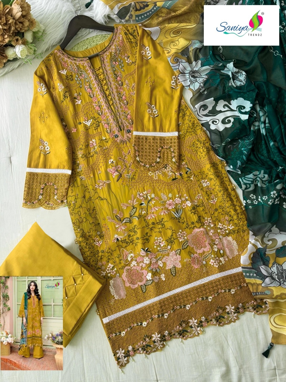 Shop SANIYA TRENDZ 7182 C with Cotton Chikankari embroidered top, Cotton Payal Bunches bottom and Maslin printed dupatta at ₹999/-.